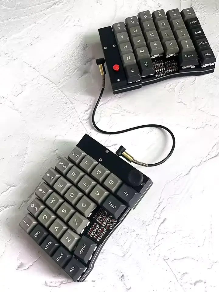 image of do52, number row, hat switch on left-hand-side, and trackpoint on right-hand side to the side